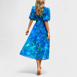 Clara | Elegantna midi haljina sa cvetovima