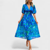 Clara | Elegantna midi haljina sa cvetovima