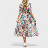 Clara | Elegantna midi haljina sa cvetovima